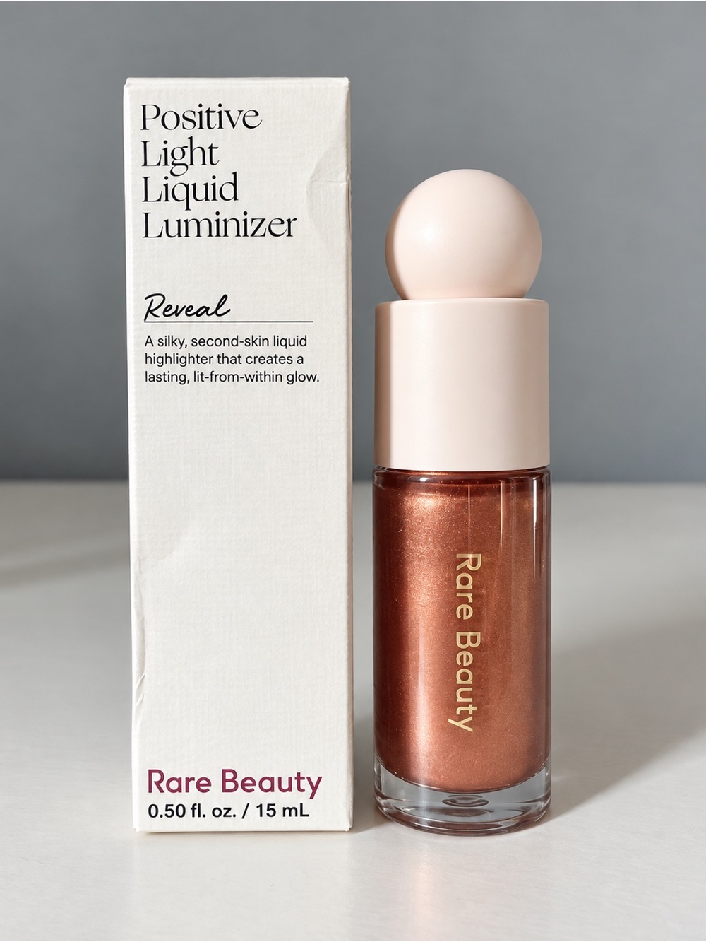Rare Beauty Positive Light Liquid Luminizer — Reveal